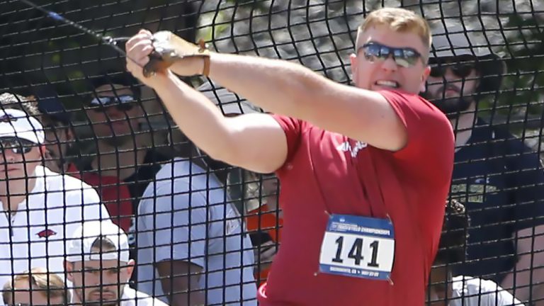 Sullins has historic throw at NCAA prelim; Hogs advance nine