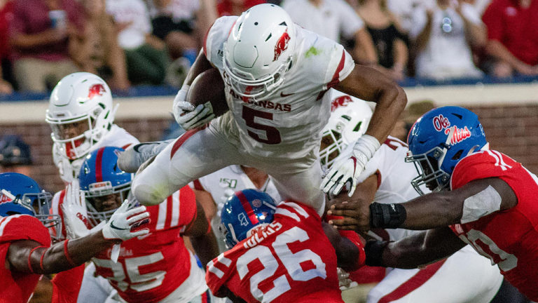 Rebels manage to add another score, hang on for win as Hogs sputter