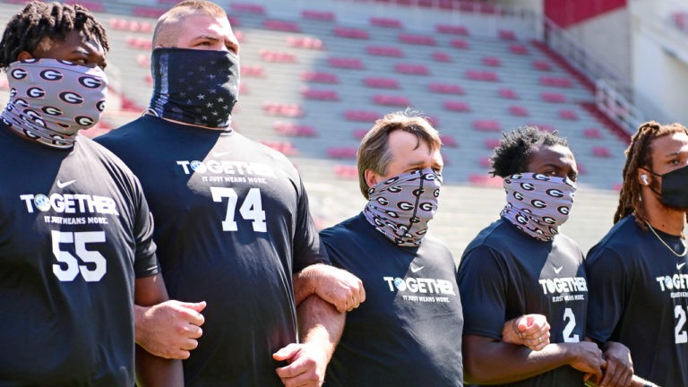 Hogs, Bulldogs deliver together for unity before Saturday’s kickoff