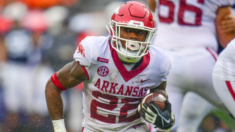 Hogs’ KJ Jefferson, Trelon Smith after Thursday’s practice for Outback Bowl