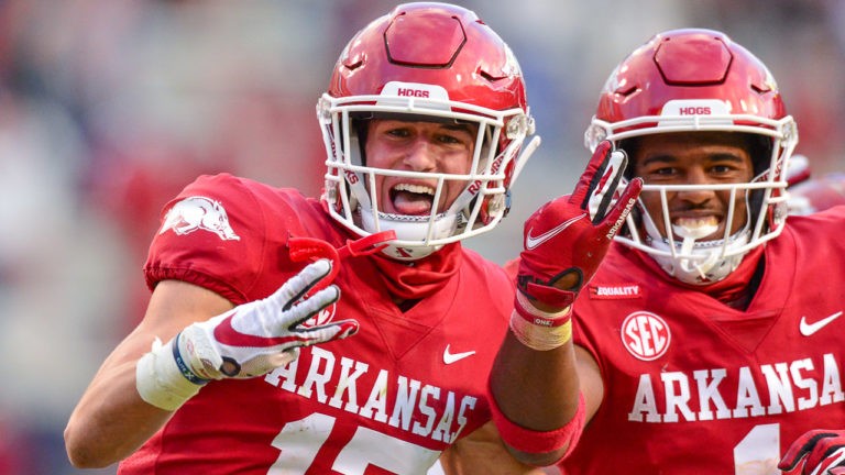 Hogs’ Drew Sanders, Hudson Clark on the defense in close loss to Tigers