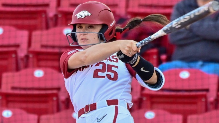 Hogs win another to keep streak alive, but need extra innings