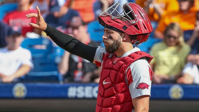 Opitz says he made right decision coming back to Hogs this season