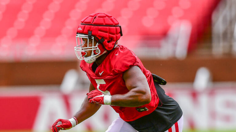 Building depth in lines key to Hogs having success, Henry says