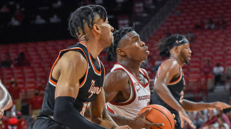 Hogs’ Davonte Davis: On playing point guard, billboard outside home town