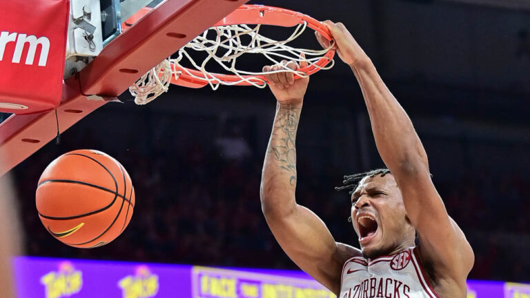 Late burst gives Razorbacks a win over Mercer to open season
