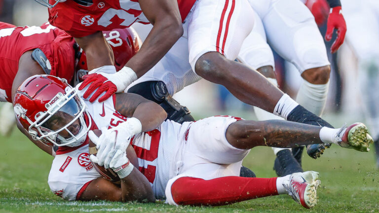 Hogs manage to cling to being ranked in AP poll