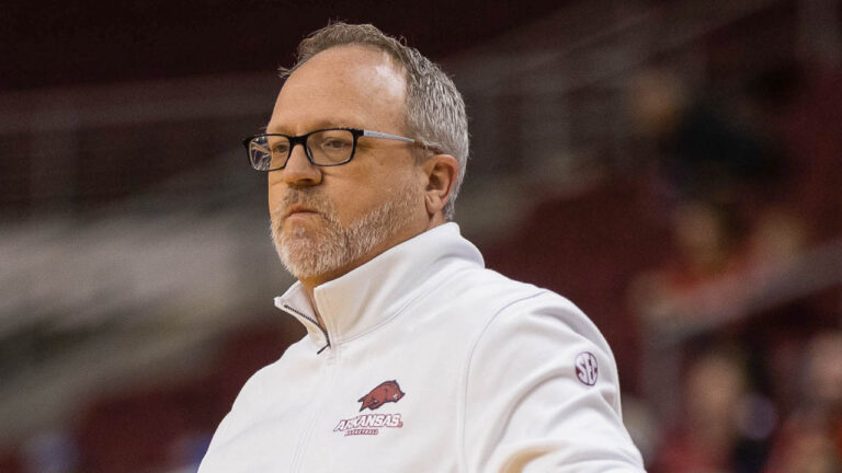 Hogs coach Mike Neighbors, Jersey Wolfenbarger after win over UCA