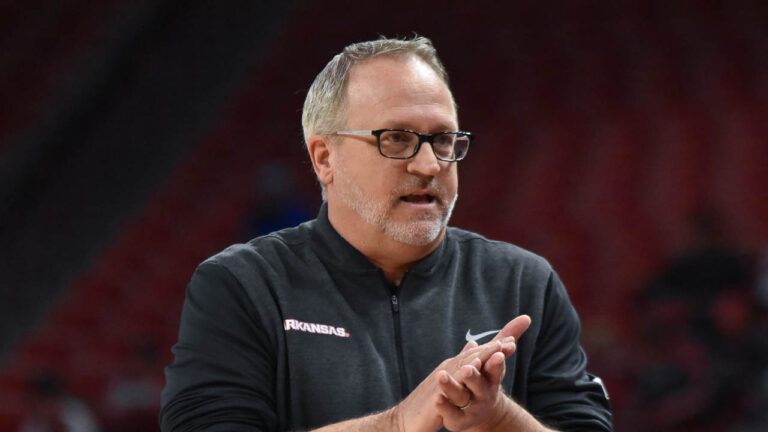 Hogs coach Mike Neighbors on a lot of things … and none are about sports