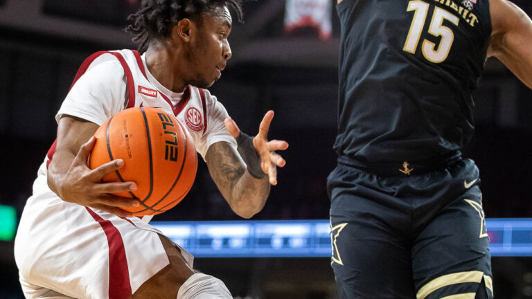 Dawson on tall hill facing Razorbacks to reach NCAA after rough start