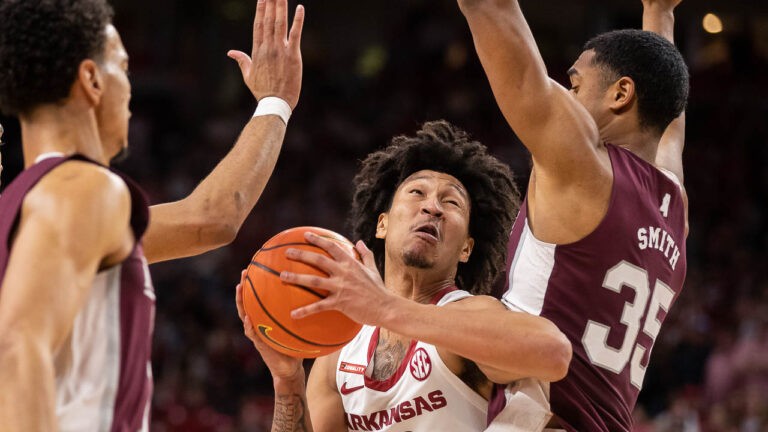 Clutch shots at end push Hogs past Mississippi State, 64-55