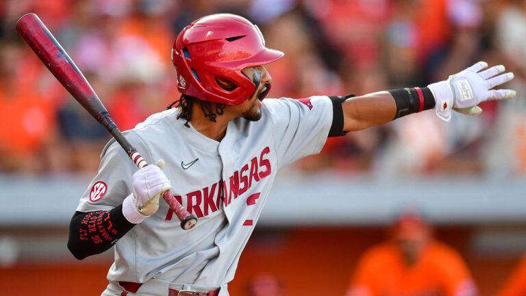 Clay Henry on Razorbacks finding way to survive, advance