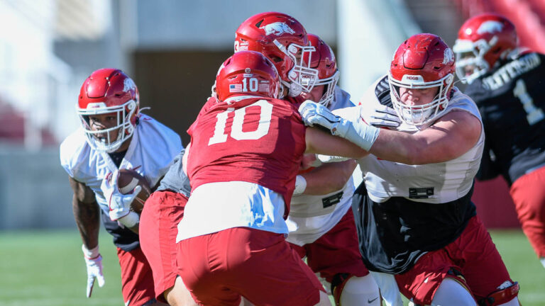 Hogs’ Ricky Stromberg, Bumper Pool after first day of practice Friday