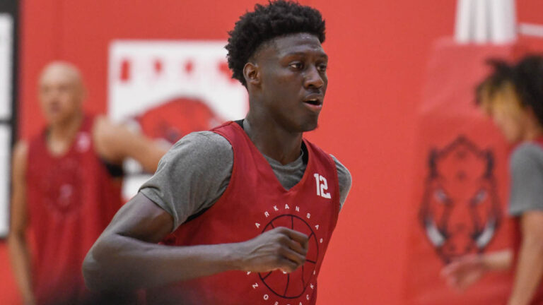 Hogs’ Jordan Walsh, Barry Dunning, Jalen Graham after practice Wednesday