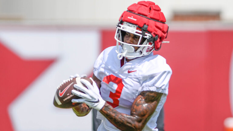 Hogs’ Myles Slusher, Warren Thompson, Matt Landers after Tuesday practice