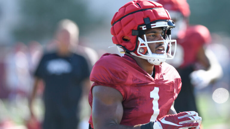 Hogs’ Jalen Catalon, KJ Jefferson after practice Tuesday for opener