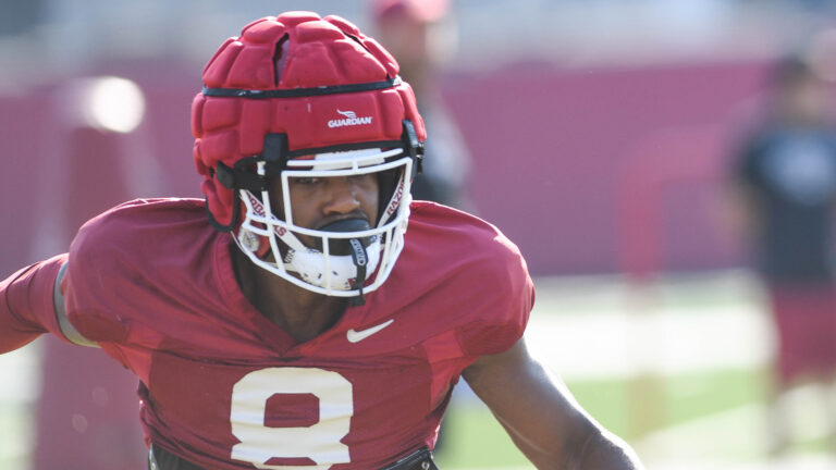 Hogs’ defensive backs Jayden Johnson, Simeon Blair after practice