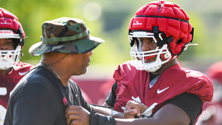 Razorbacks’ Jordan Domineck, Jadon Haselwood after Tuesday’s practice