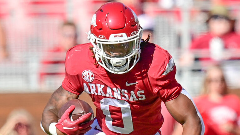 Razorbacks’ offensive lineman Brady Latham, running back AJ Green