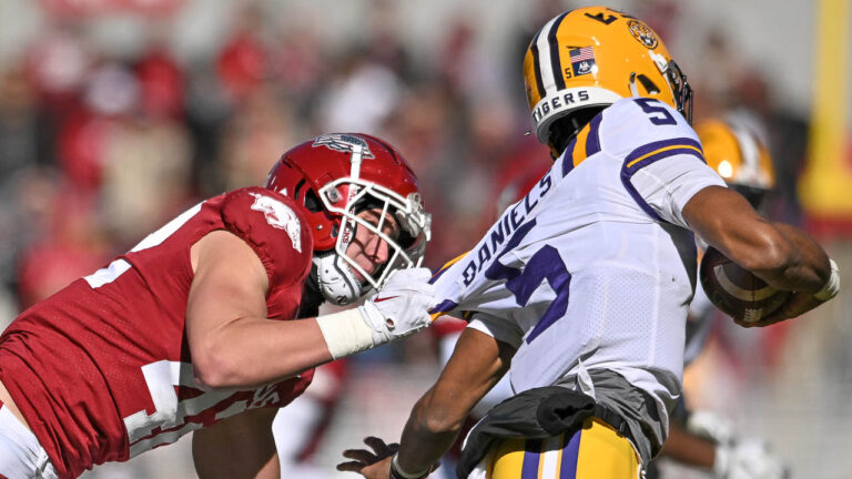 Razorbacks linebacker Drew Sanders, defensive back Hudson Clark