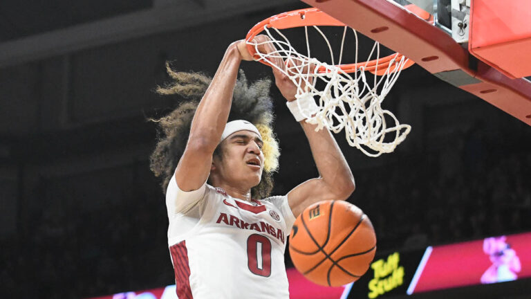 Hogs finally get late run to subdue pesky Troy, 74-61