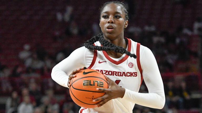 Hogs manage to hang on somehow to down Auburn