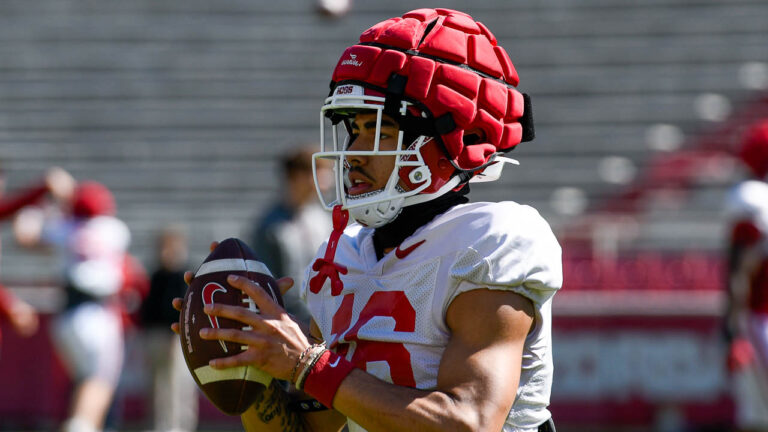 Hogs’ running back AJ Green, wide receiver Isaiah Sategana after practice