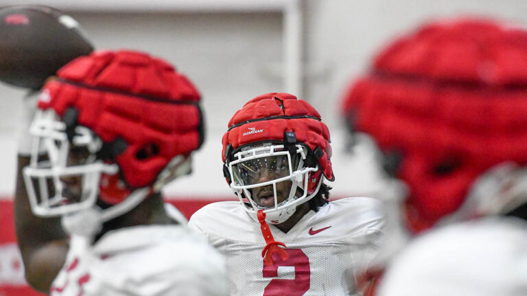 Razorback wide receivers Andrew Armstrong, Isaiah Sategna after practice