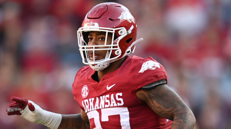 Razorbacks’ Joshua Braun and Chris “Pooh” Paul after practice