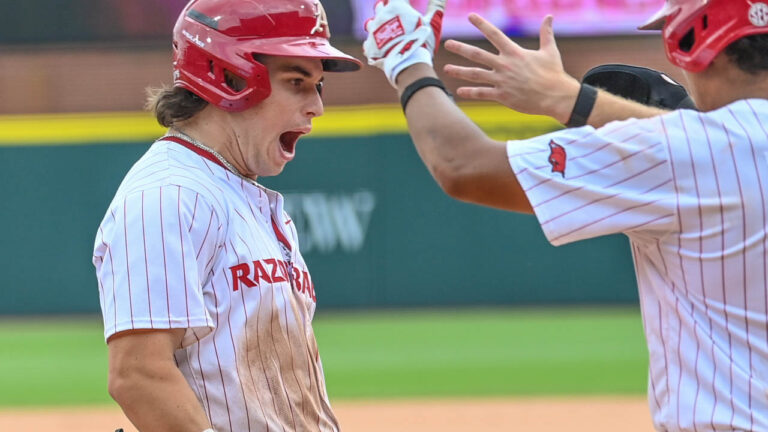 Peyton Holt lifts Hogs to win in first, but big inning prevents sweep