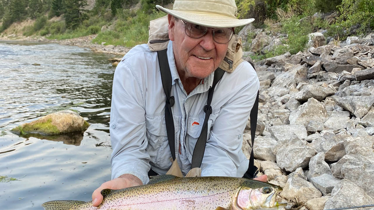 Dr. David Knowles with a rainbow trout in the Missouri River