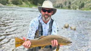 Dr. Knowles' son John caught a Missouri River brown trout July 2 on a Knowles midge