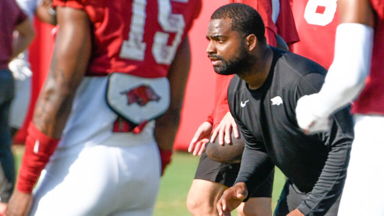 Razorbacks’ cornerbacks coach Deron Wilson after practice Monday