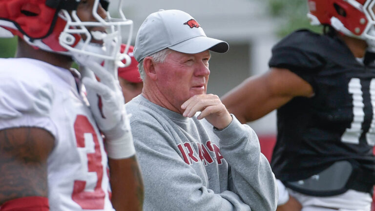 Hogs’ offensive coordinator Bobby Petrino with media after practice