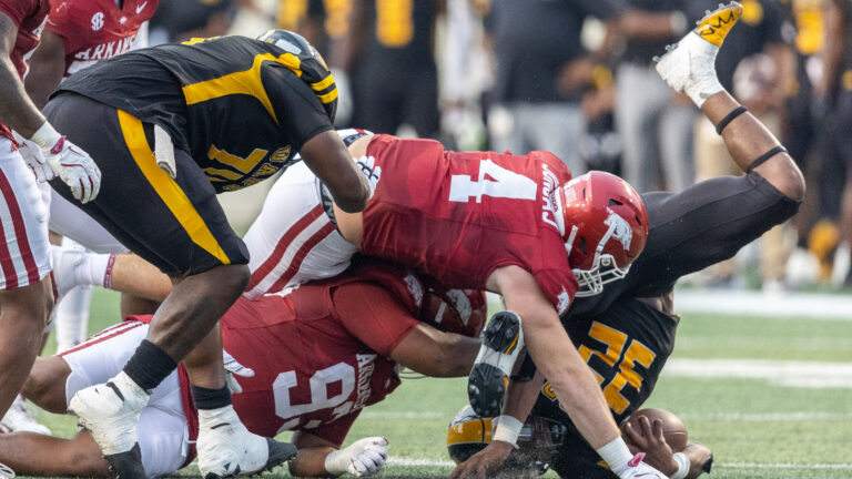Razorbacks’ defensive players Nico Davillier, Eric Gregory on win