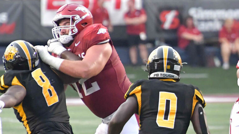 Hogs’ Jayden Johnson, Joshua Braun on one time playing Cowboys