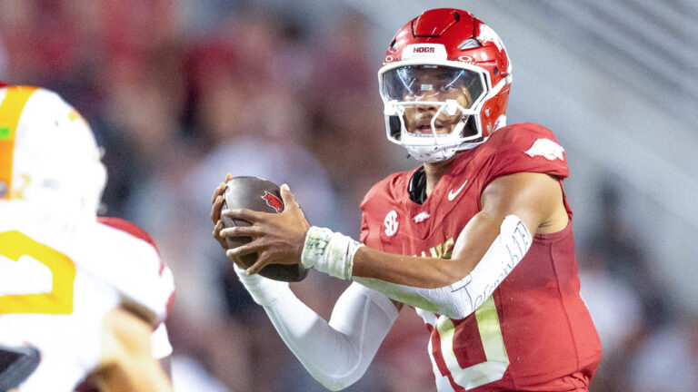 Razorbacks quarterback Taylen Green takes a snap against Tennessee