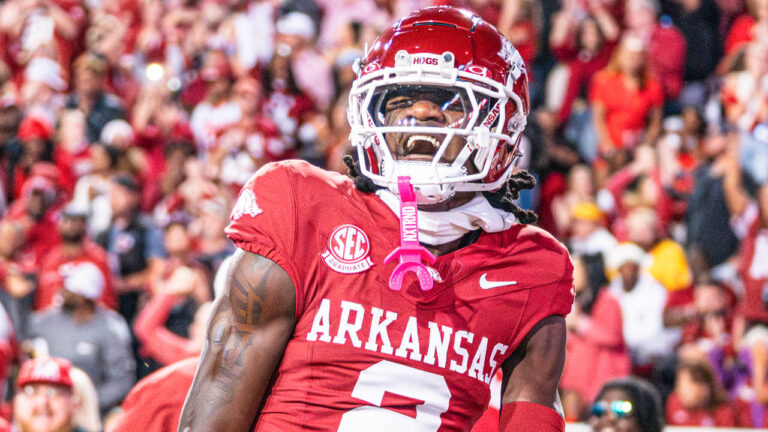 Razorbacks’ Andrew Armstrong, Nico Davillier looking at Mississippi State