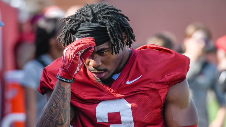 Hogs’ defensive back Doneiko Slaughter, wide receiver Isaac TeSlaa