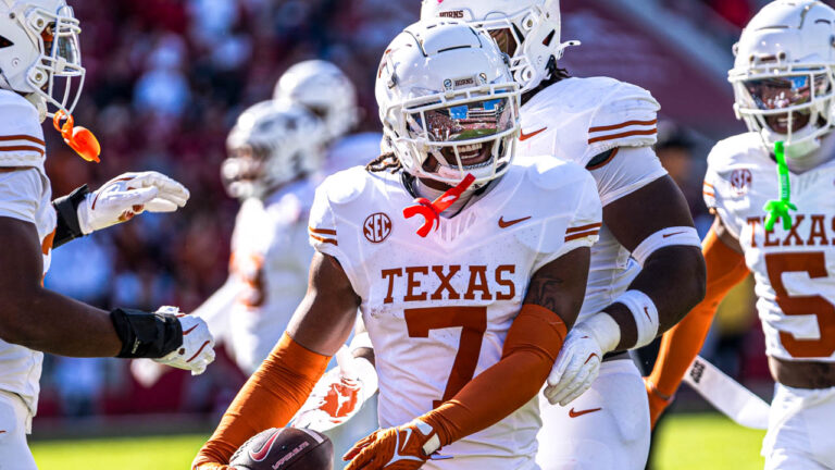 Texas wide receiver Ryan Wingo celebrates with teammates against Arkansas