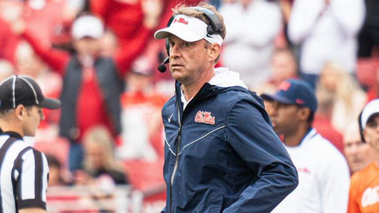 Rebels coach Lane Kiffin on the sidelines against Arkansas