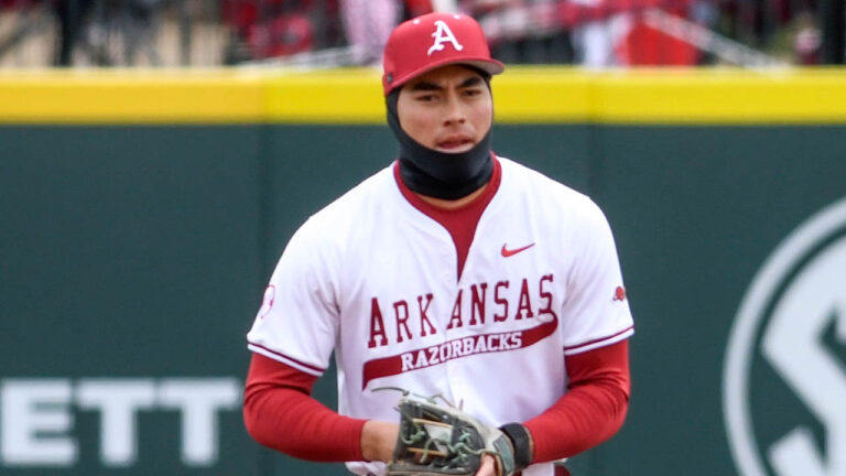Razorbacks shortstop Wehiwa Aloy on the field during opening game against Washington State