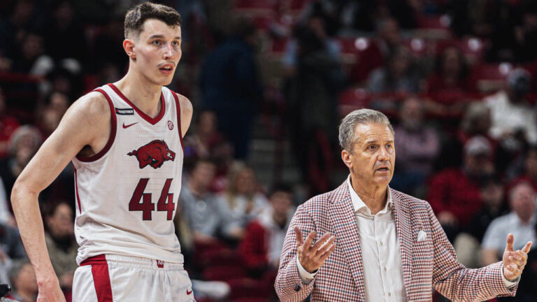 Razorbacks forward Zvonimir Ivisic and coach John Calipari against LSU