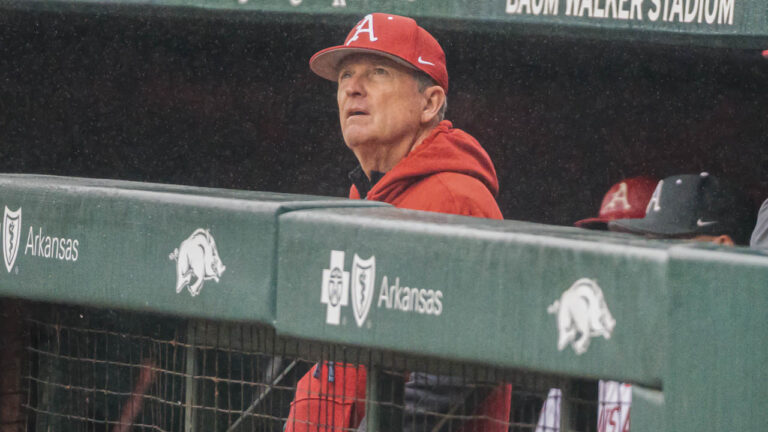 Razorbacks coach Dave Van Horn in the dugout during game with Washington State