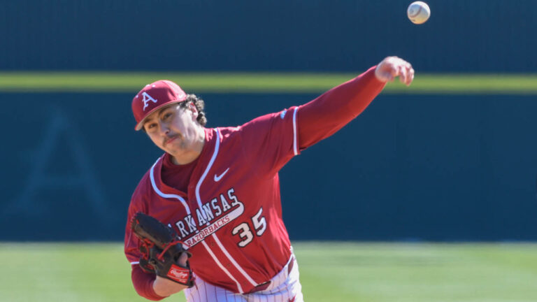 Razorbacks pitcher Landon Beidelschies delivers a pitch against Washington State