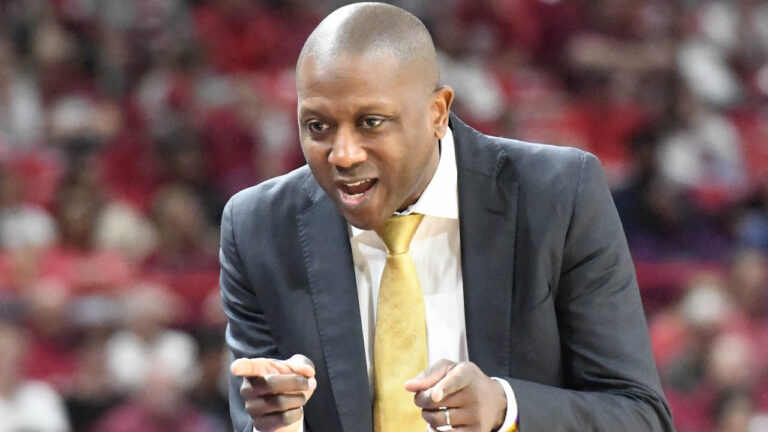 Tigers coach Dennis Gates on the sidelines against Arkansas