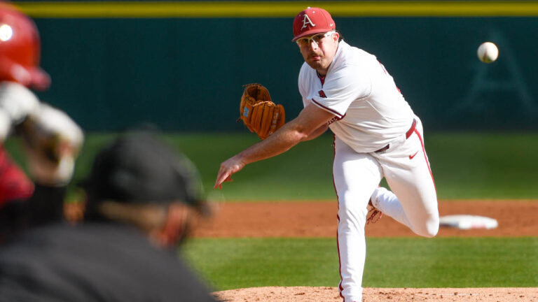 Razorbacks pitcher Colin Fisher delivers against ULM