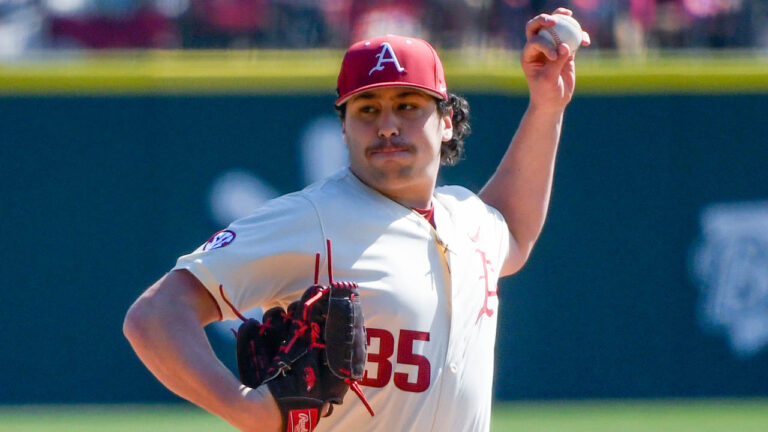 Razorbacks pitcher Landon Beidelschies delivers a pitch against Portland