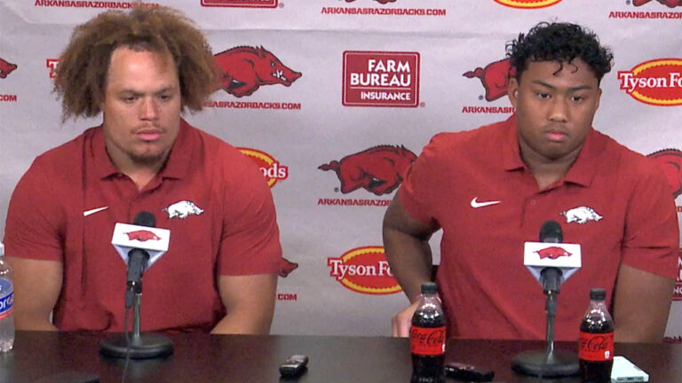 Razorback tight ends Rohan Jones, Jaden Platt after practice Saturday
