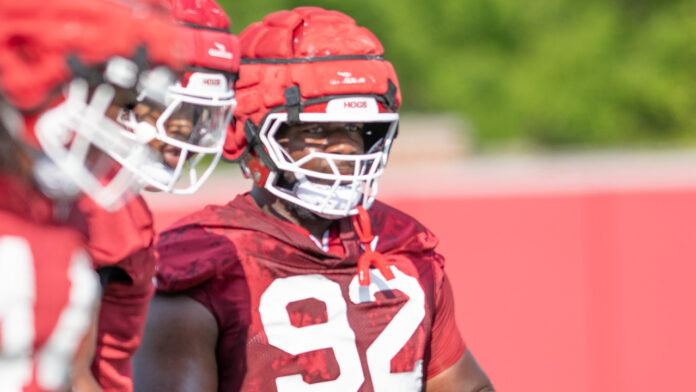 Arkansas Razorbacks defensive lineman David Oke during preseason drills on the outdoor practice fields